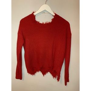 Red frayed sweater
